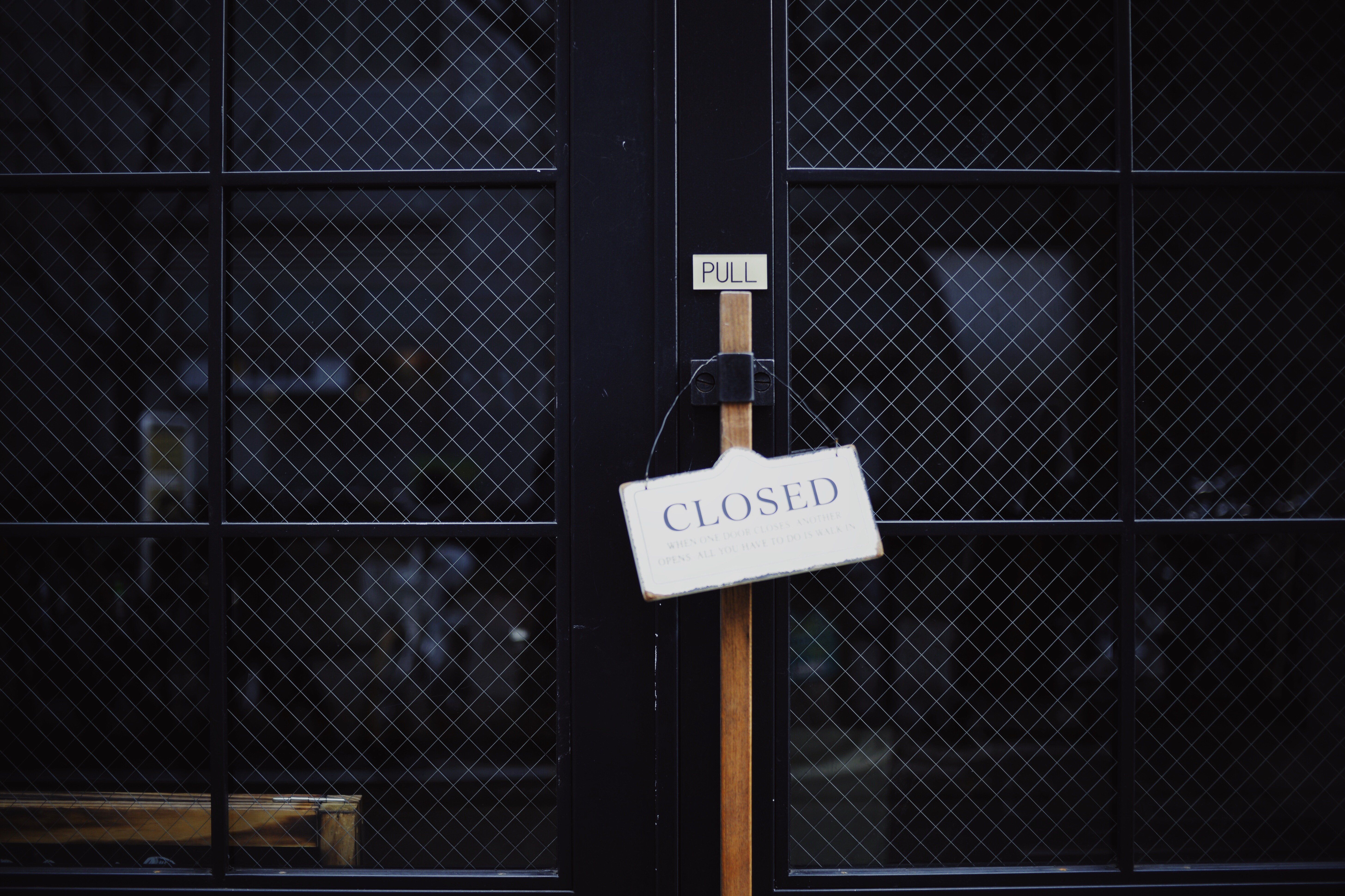 closed sign on a door closed sign on a door