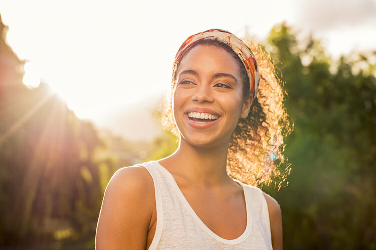 Smiling woman, wearing headband Smiling woman, wearing headband