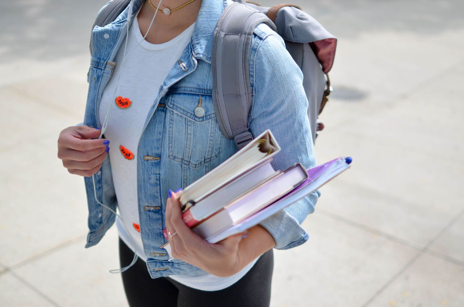 a person carrying books 